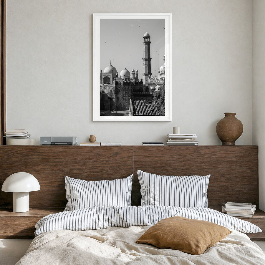 Lahore Photo Poster in a white wood frame, hanging in a bedroom, white border