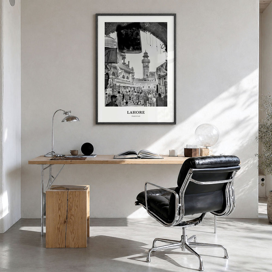 Lahore Classic No 1 Poster in a black wood frame, hanging in a bright home office
