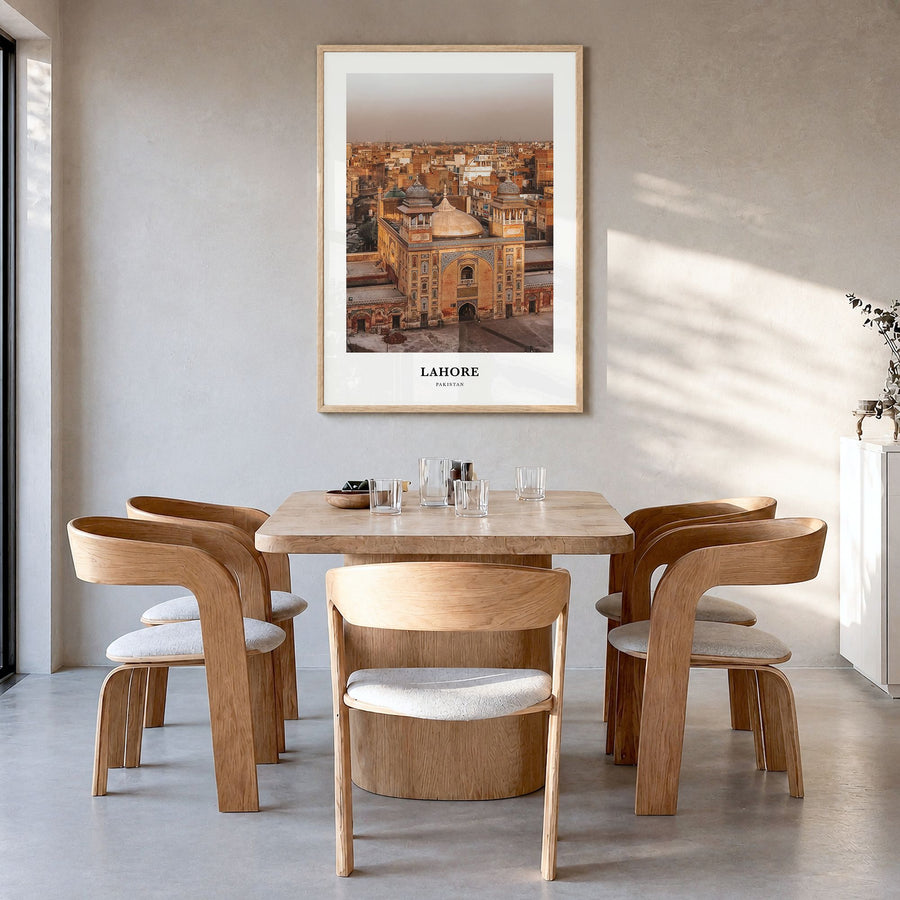 Lahore Classic Poster in a natural wood frame, hanging in a dining room