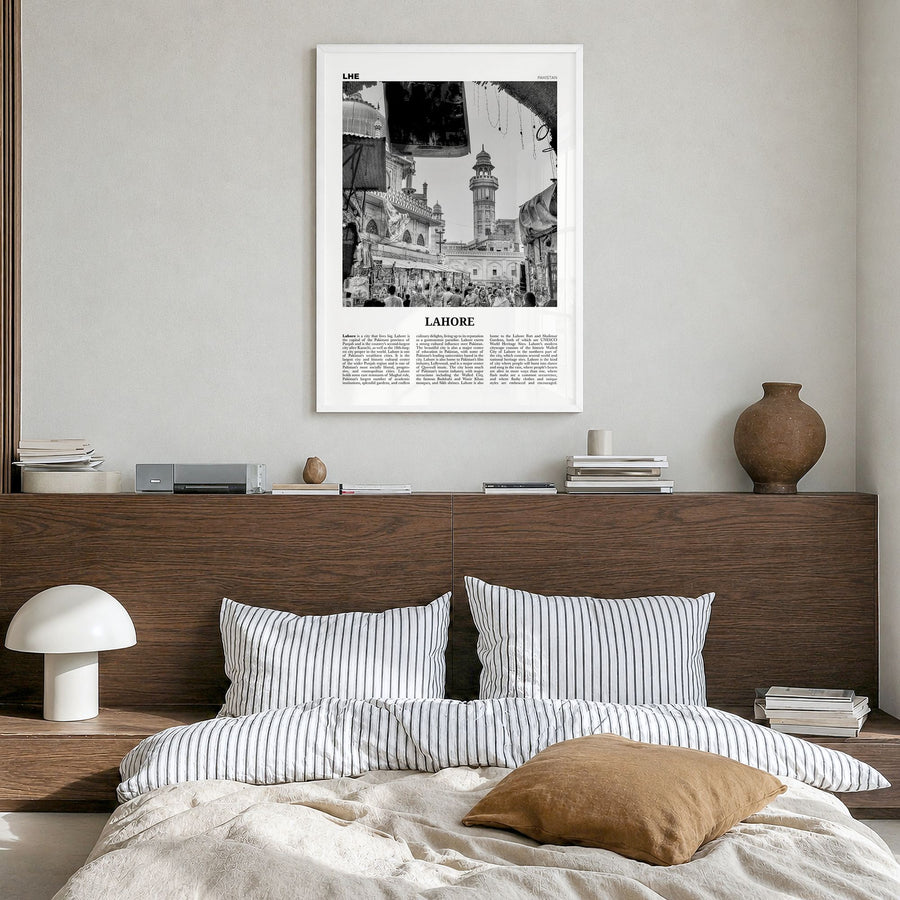 Lahore Newspaper No 1 Poster in a white wood frame, hanging in a bedroom