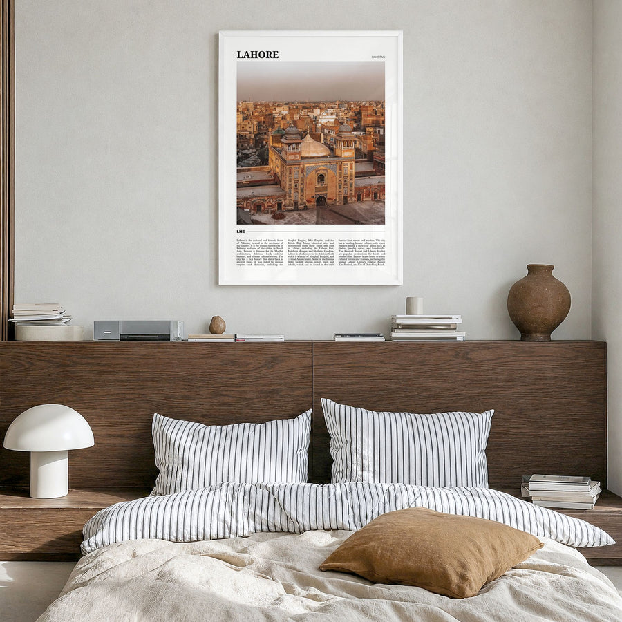 Lahore Travel Poster in a white wood frame, hanging in a bedroom