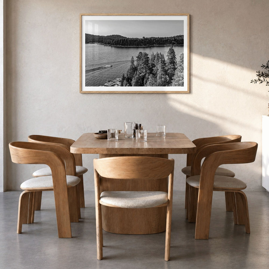 Lake Arrowhead Photo Poster in a natural wood frame, hanging in a dining room, white border
