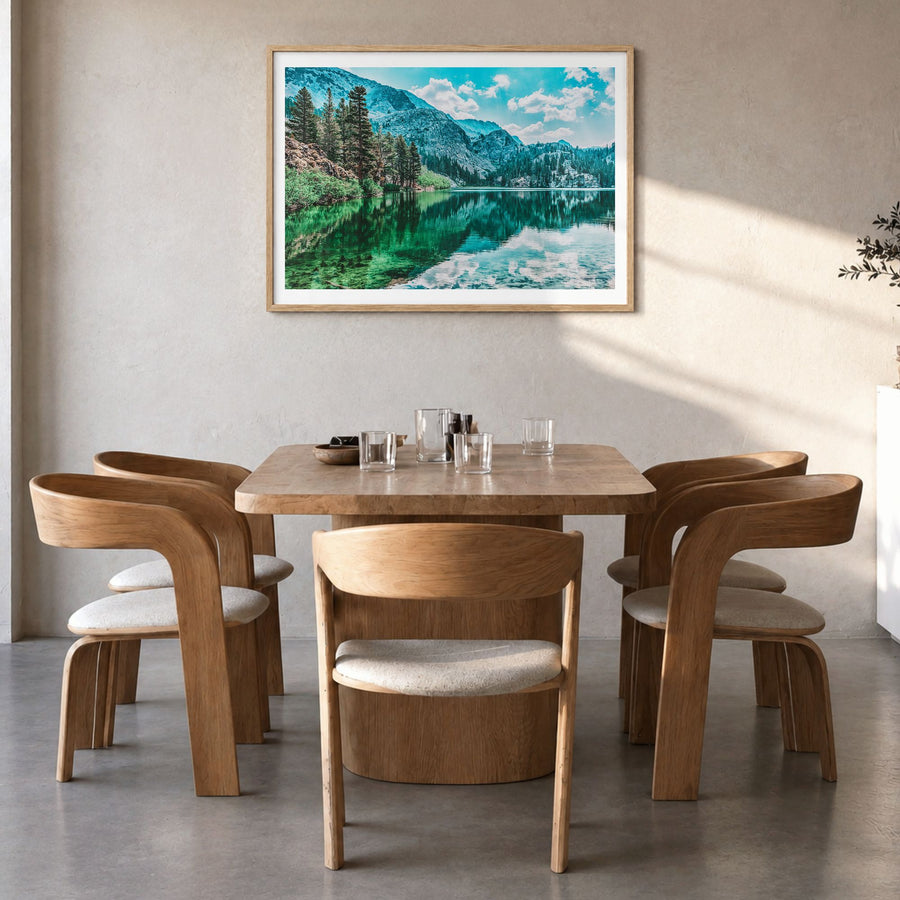 Lake Arrowhead Photo Poster in a natural wood frame, hanging in a dining room, white border