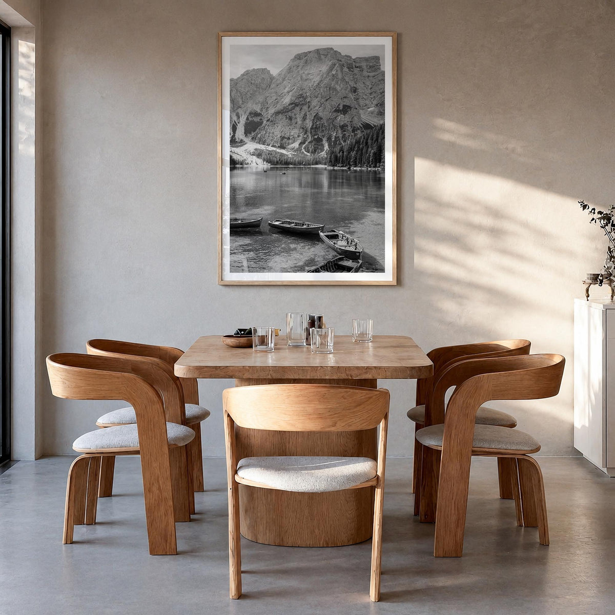 Lake Braies black & white photo poster of Italy – vertical wall art in natural wood frame with white border, hanging on wall
