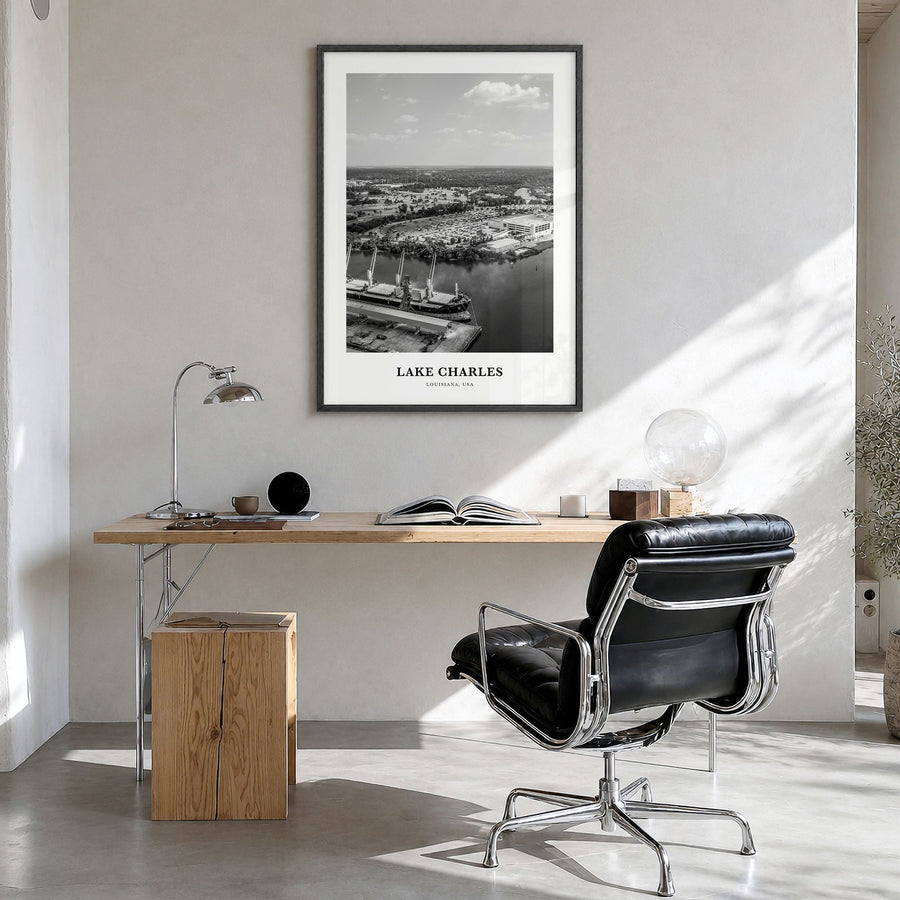 Lake Charles Classic Poster in a black wood frame, hanging in a bright home office
