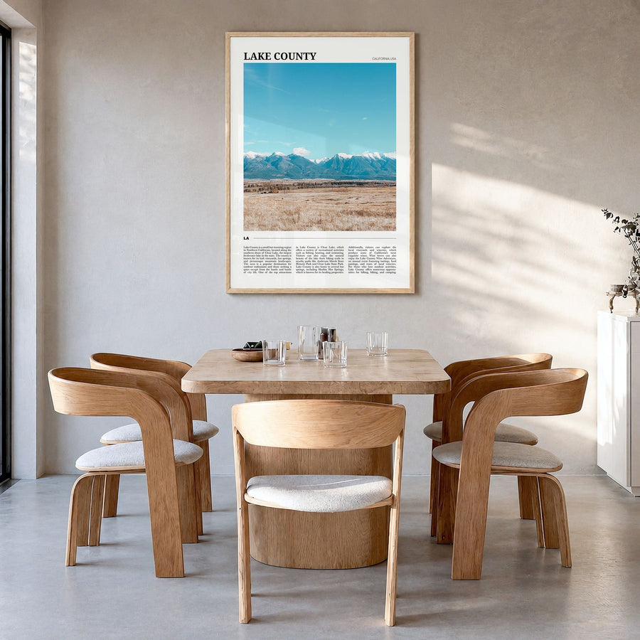 Lake County Travel Poster in a natural wood frame, hanging in a dining room