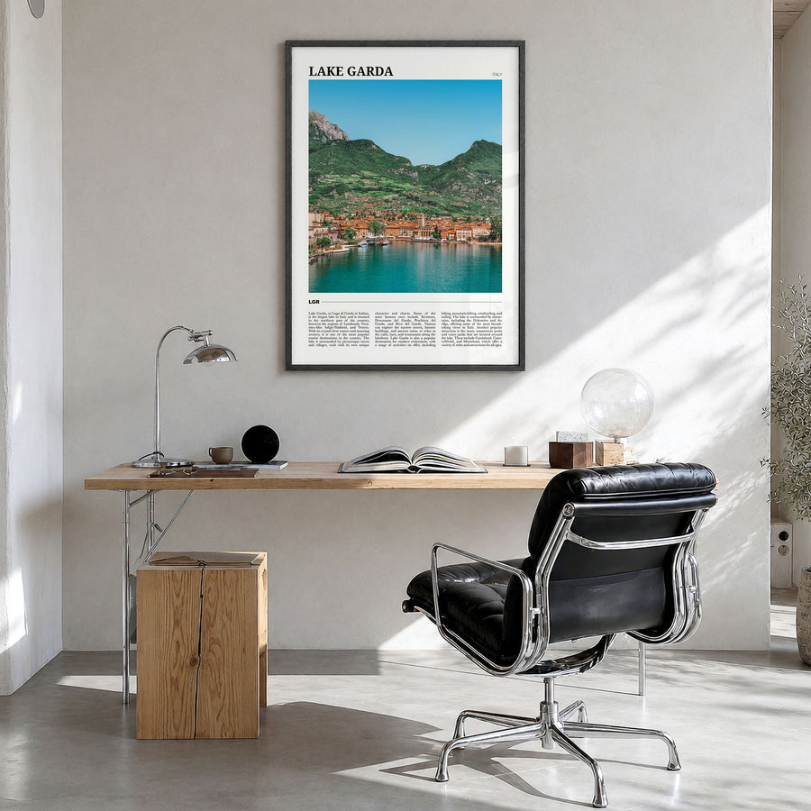 Lake Garda Travel Poster in a black wood frame, hanging in a bright home office