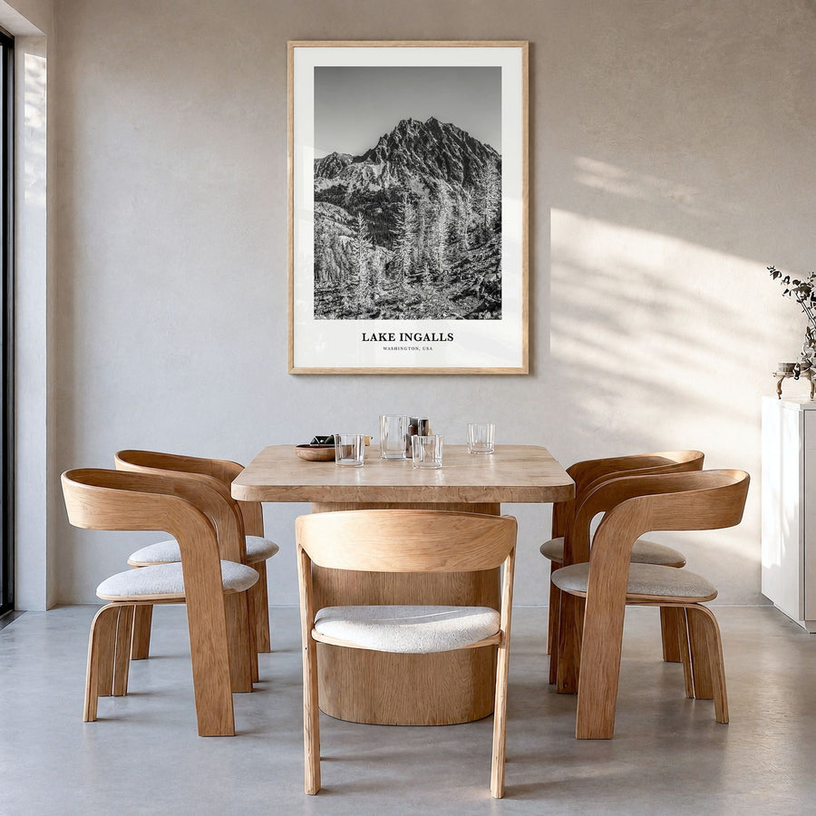 Lake Ingalls Classic Poster in a natural wood frame, hanging in a dining room