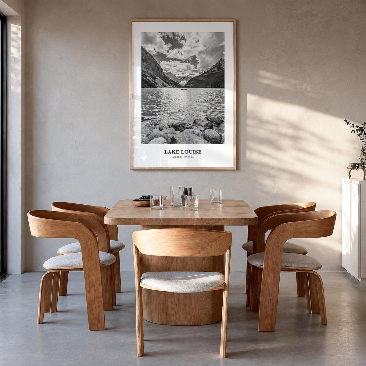 Lake Louise no. 2 black & white classic poster of Alberta, Canada – vertical wall art in natural wood frame, hanging on wall