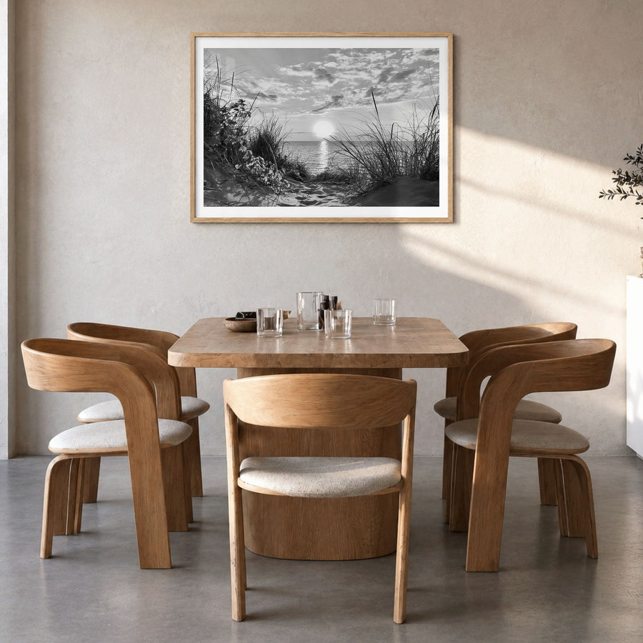 Lake Michigan Photo Poster in a natural wood frame, hanging in a dining room, white border