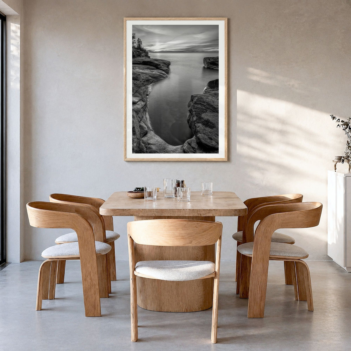 Lake Michigan Photo No 2 Poster in a natural wood frame, hanging in a dining room, white border