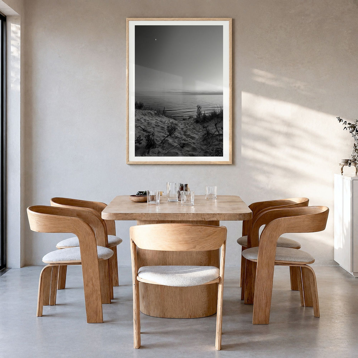 Lake Michigan Photo No 3 Poster in a natural wood frame, hanging in a dining room, white border