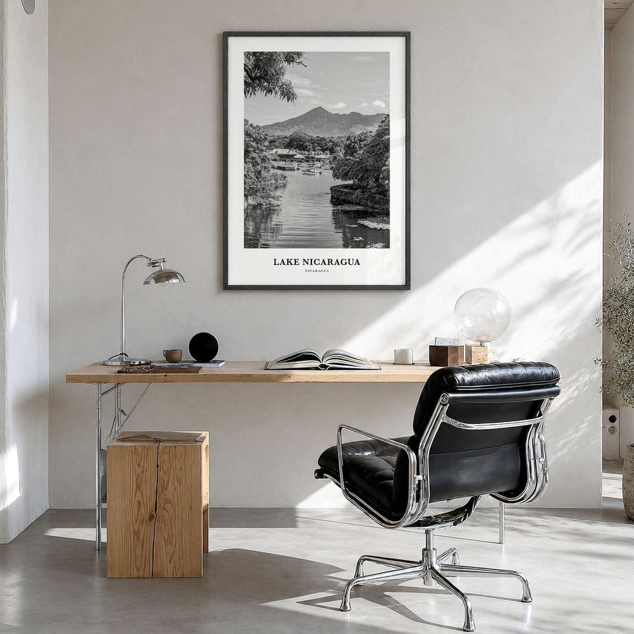 Lake Nicaragua Classic Poster in a black wood frame, hanging in a bright home office