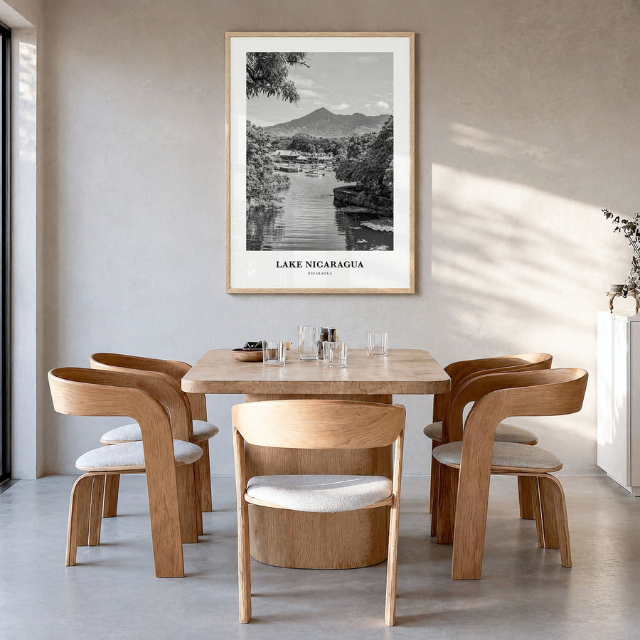 Lake Nicaragua Classic Poster in a natural wood frame, hanging in a dining room