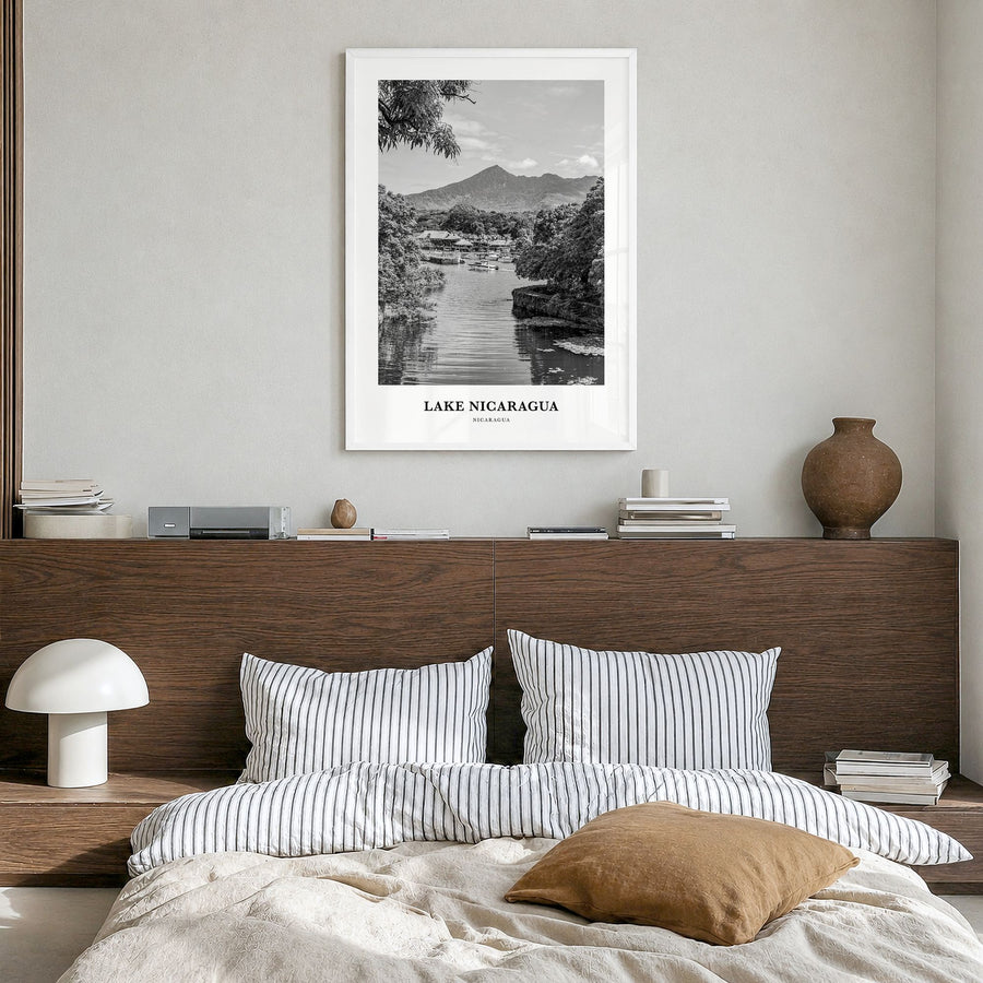 Lake Nicaragua Classic Poster in a white wood frame, hanging in a bedroom
