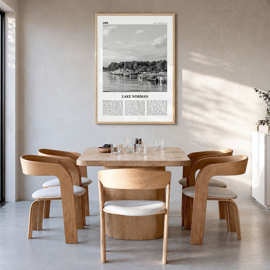 Lake Norman Newspaper Poster in a natural wood frame, hanging in a dining room