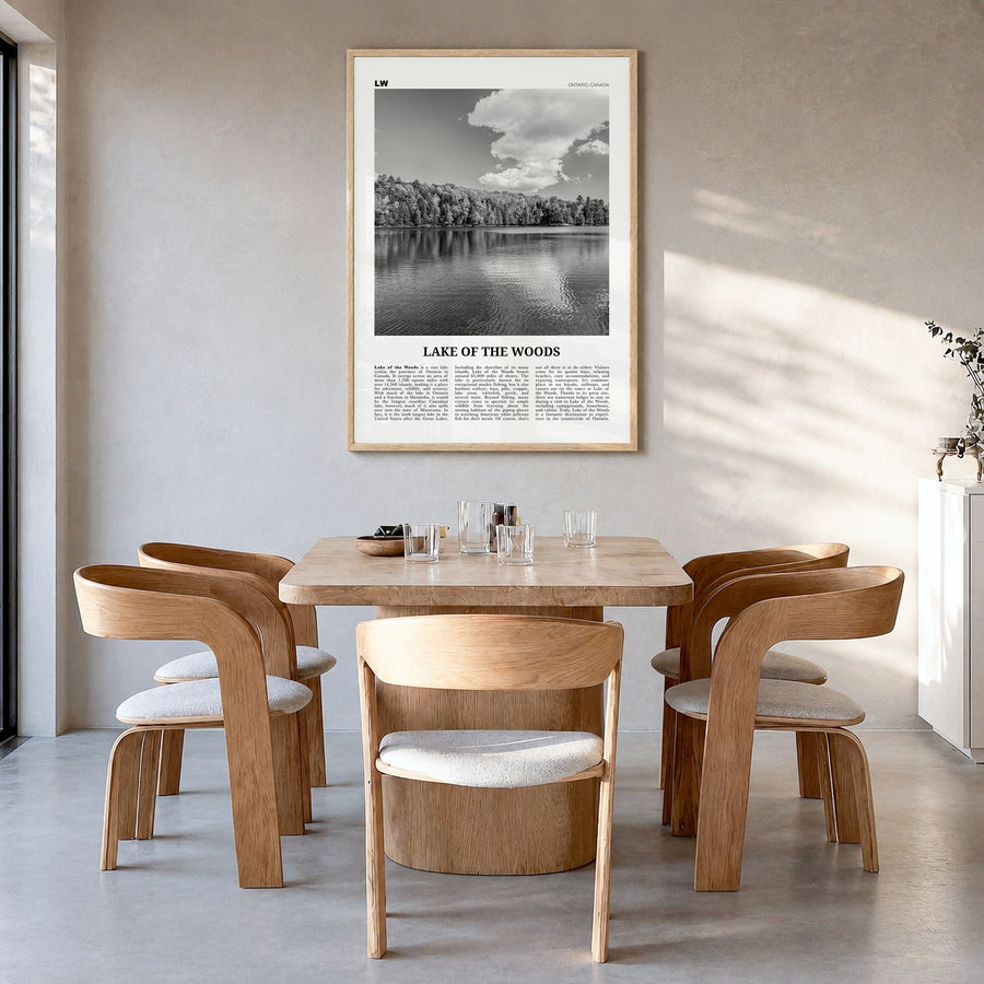 Lake of the Woods Newspaper Poster in a natural wood frame, hanging in a dining room