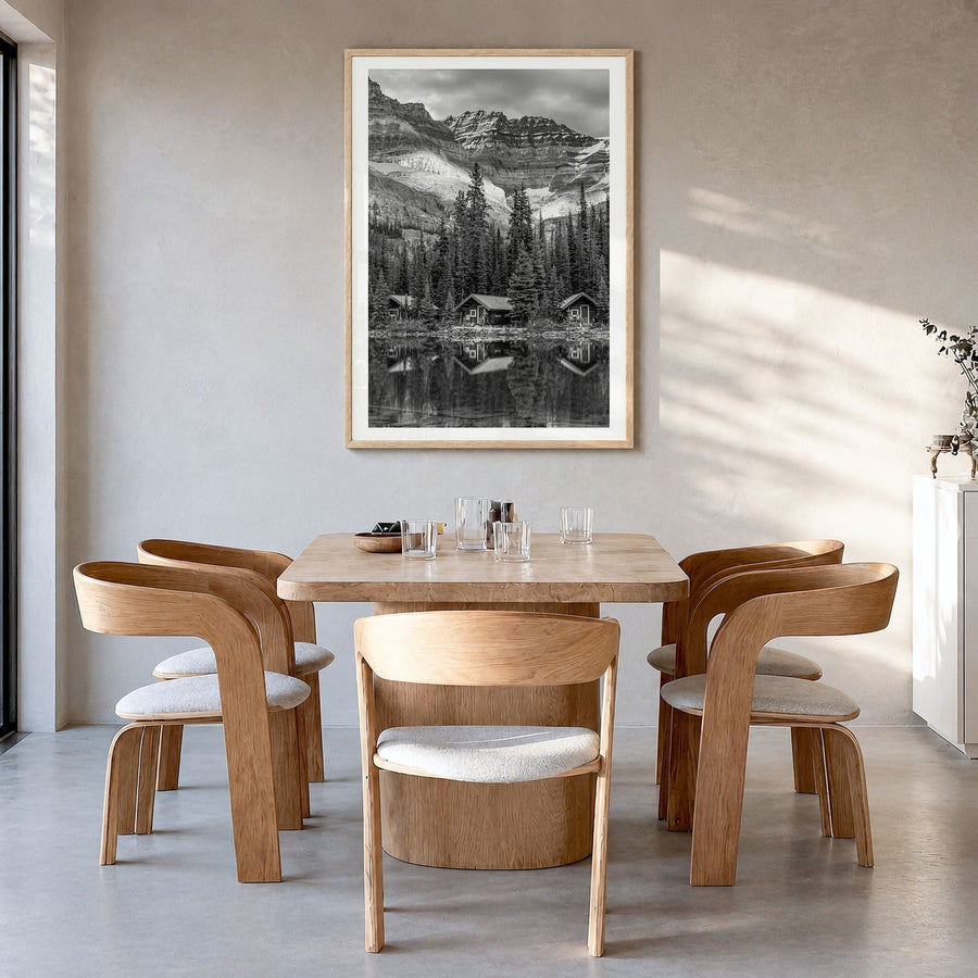 Lake O'Hara Photo Poster in a natural wood frame, hanging in a dining room, white border