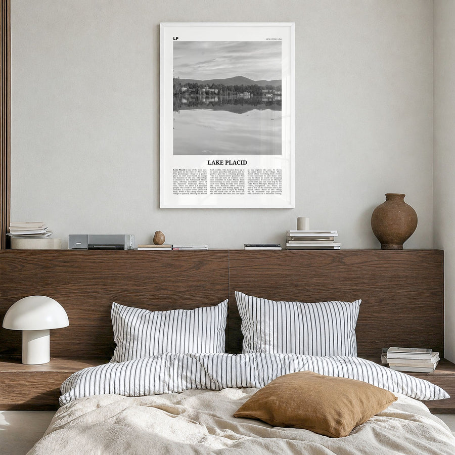Lake Placid Newspaper Poster in a white wood frame, hanging in a bedroom