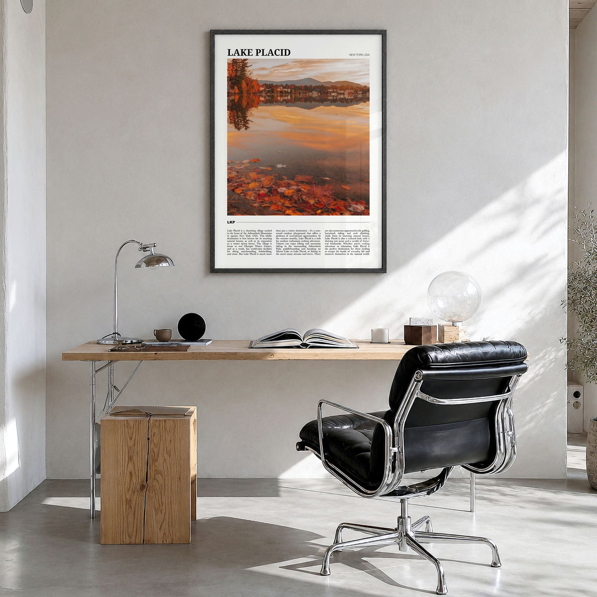Lake Placid Travel Poster in a black wood frame, hanging in a bright home office