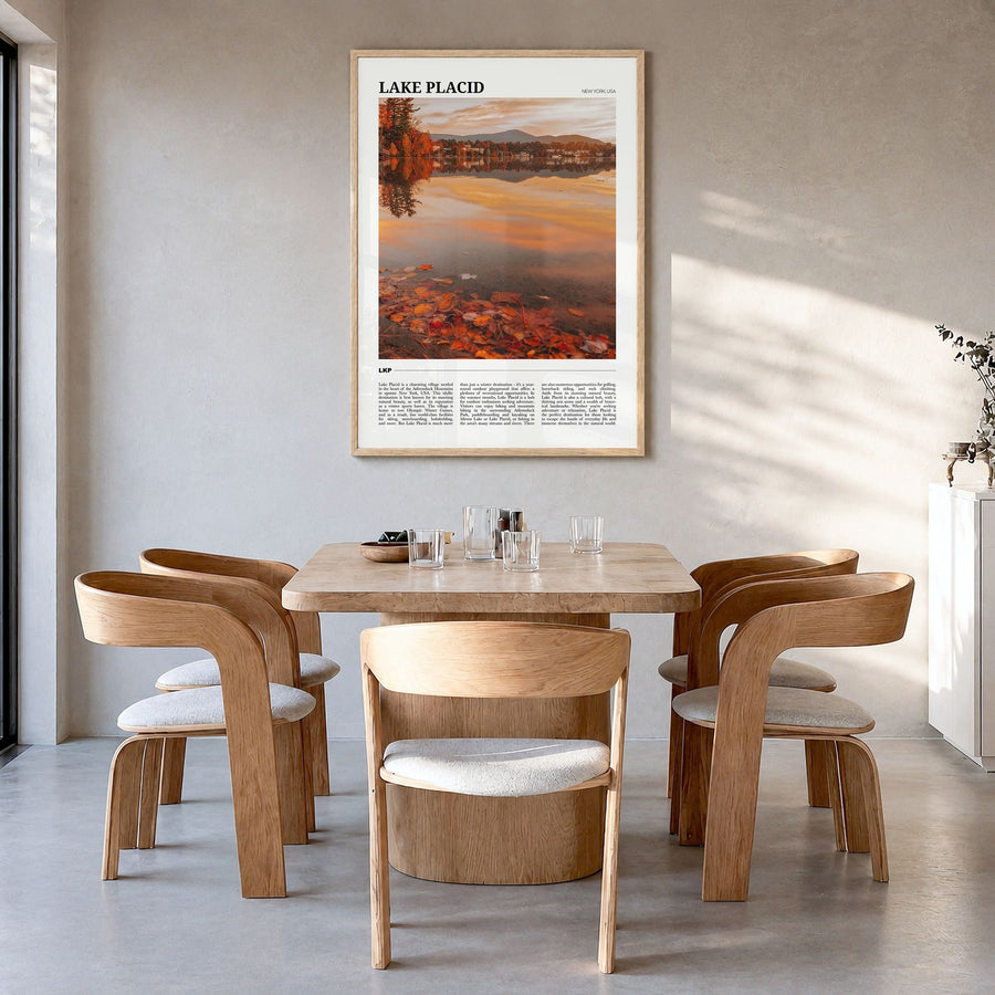 Lake Placid Travel Poster in a natural wood frame, hanging in a dining room