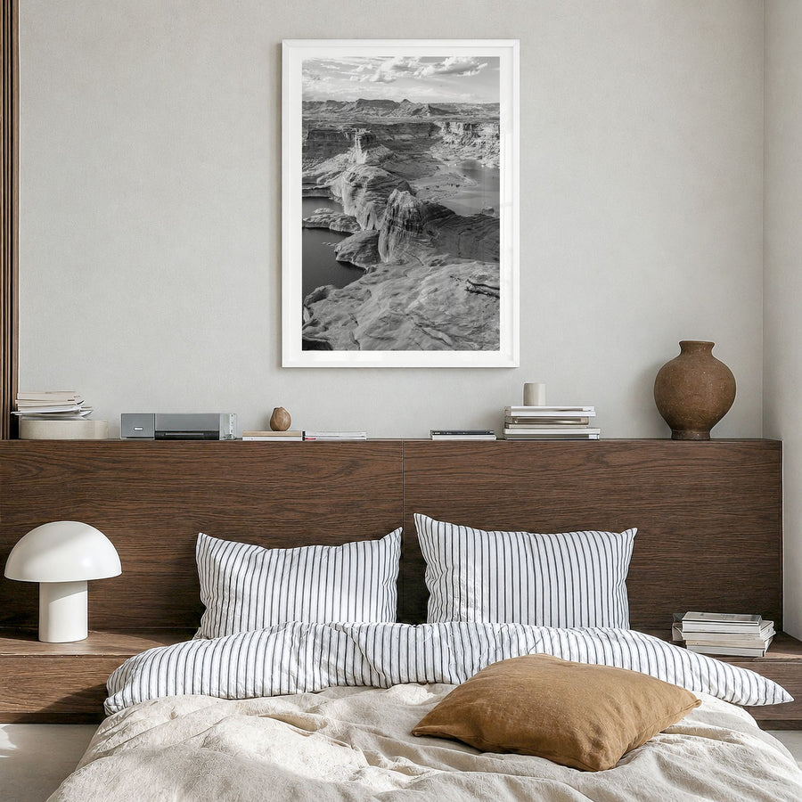 Lake Powell Photo Poster in a white wood frame, hanging in a bedroom, white border