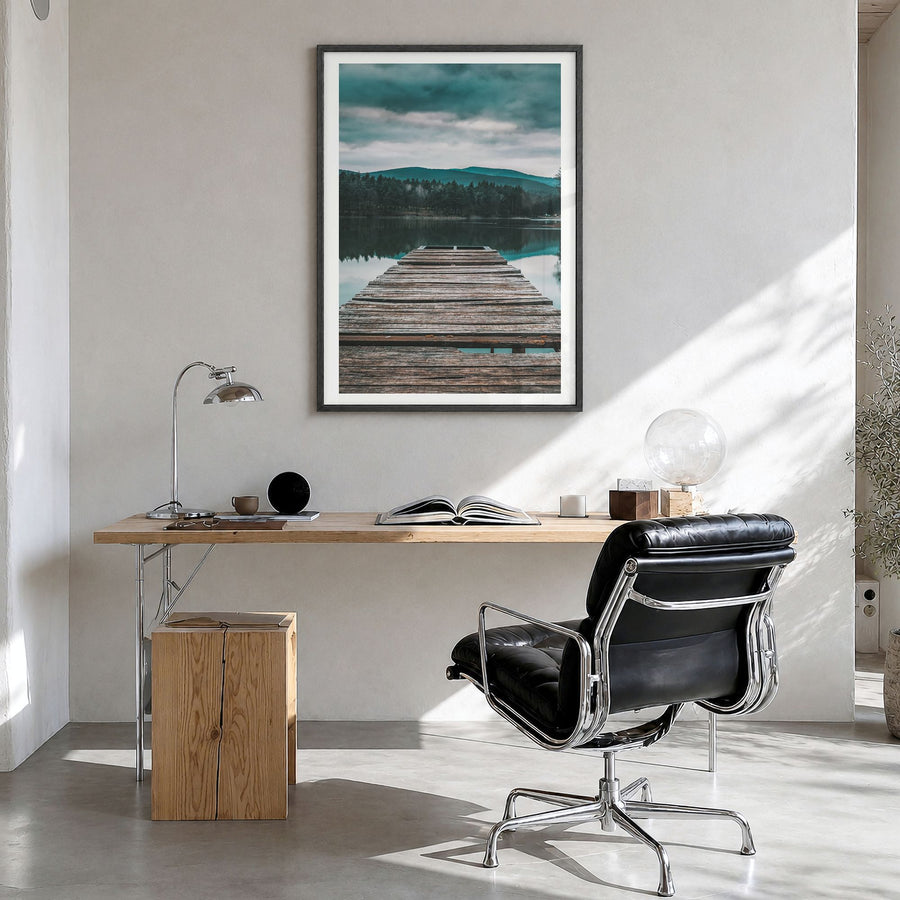 Lake Reflection Photo Poster in a black wood frame, hanging in a bright home office, white border