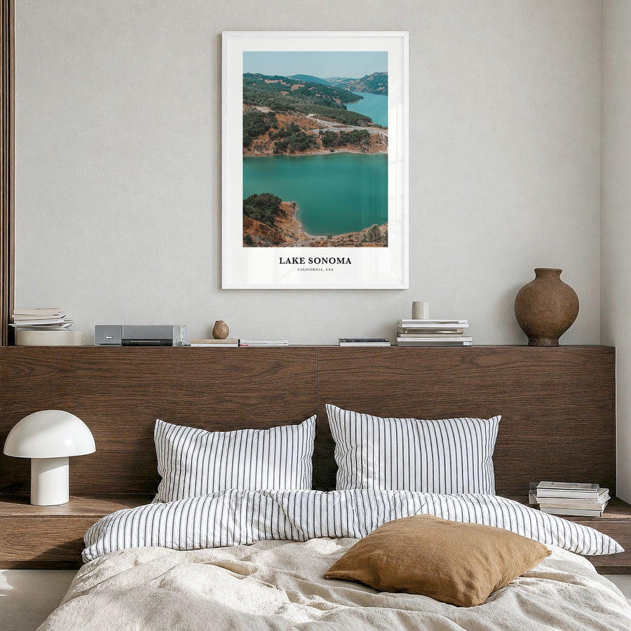 Lake Sonoma Classic Poster in a white wood frame, hanging in a bedroom