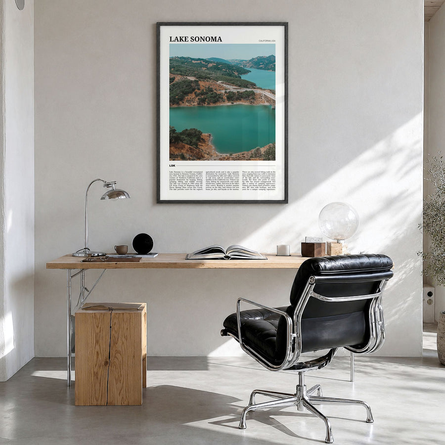 Lake Sonoma Travel Poster in a black wood frame, hanging in a bright home office
