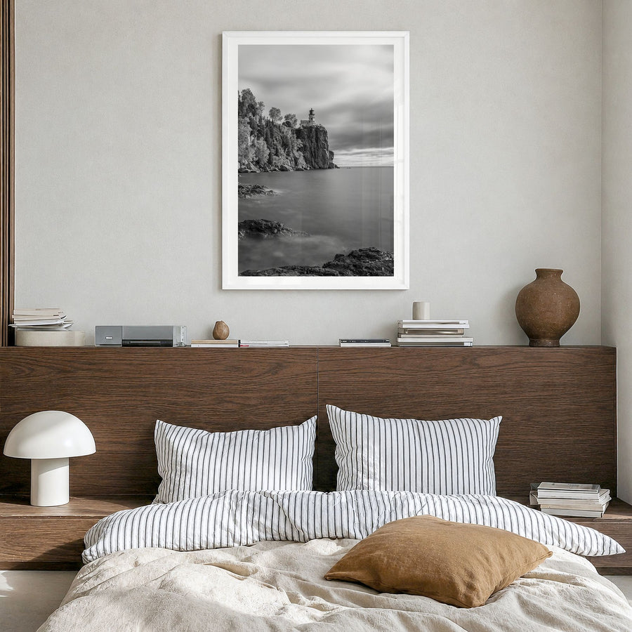 Lake Superior Photo Poster in a white wood frame, hanging in a bedroom, white border