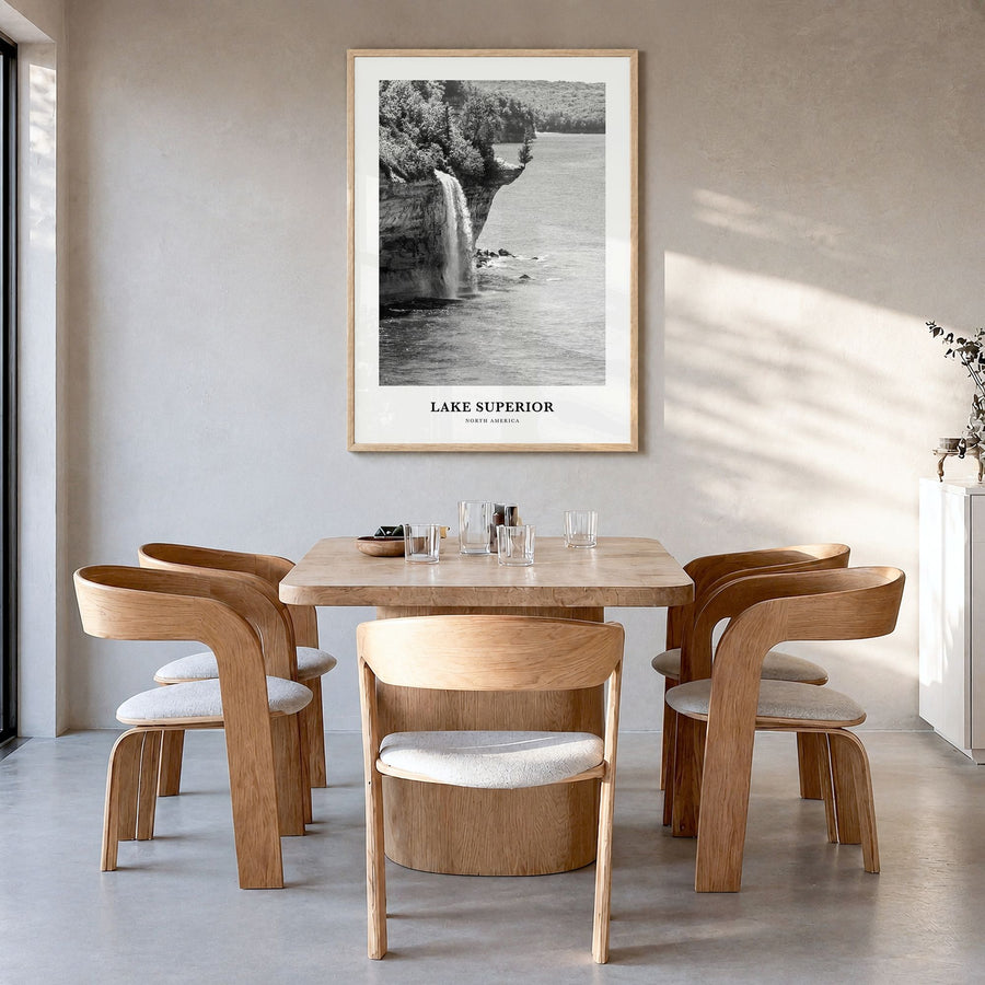Lake Superior Classic Poster in a natural wood frame, hanging in a dining room