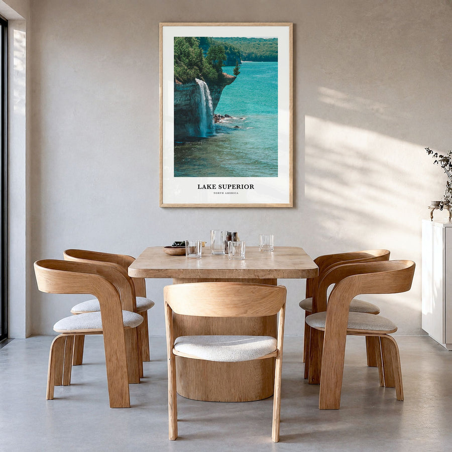 Lake Superior Classic Poster in a natural wood frame, hanging in a dining room