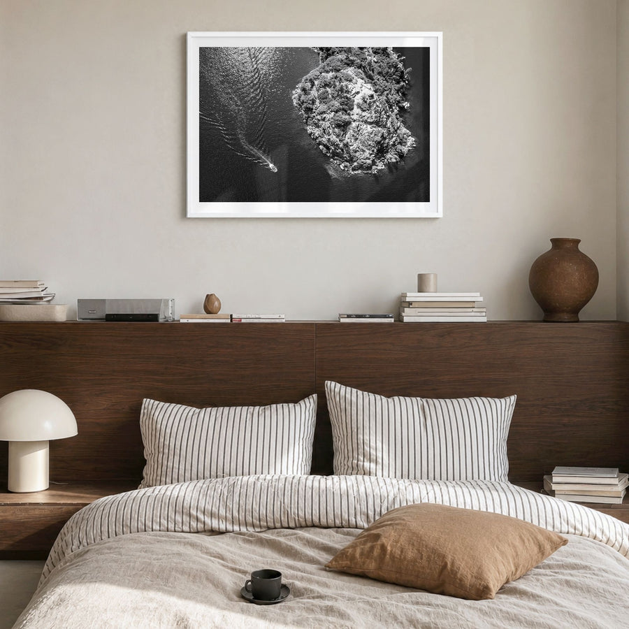 Lake Tahoe Photo Poster in a white wood frame, hanging in a bedroom, white border