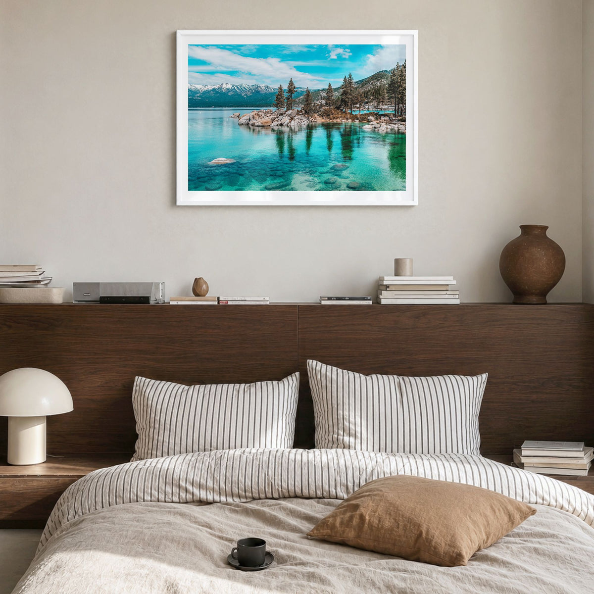 Lake Tahoe Photo Poster in a white wood frame, hanging in a bedroom, white border