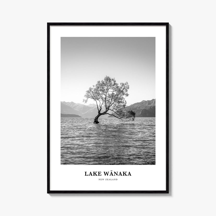 Lake Wānaka black & white classic poster of New Zealand – vertical wall art, unframed print shown in interior mockup