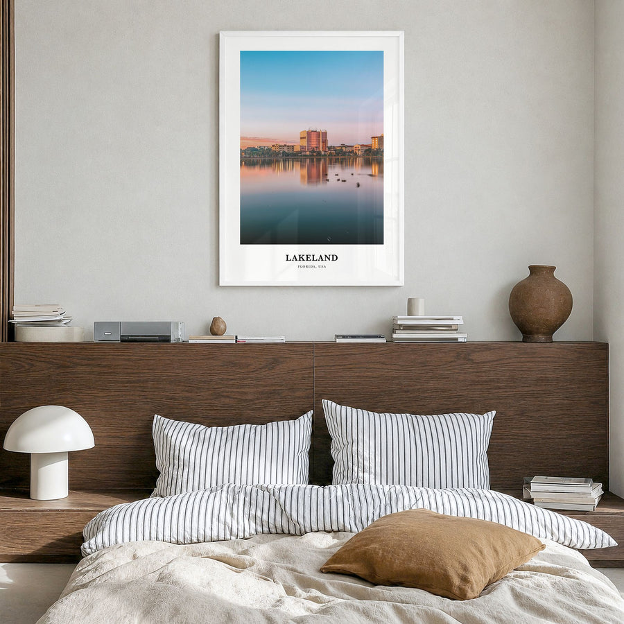 Lakeland Classic Poster in a white wood frame, hanging in a bedroom
