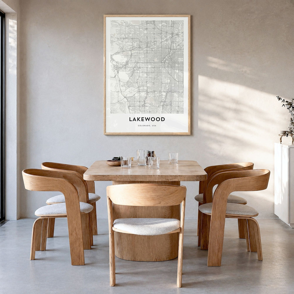 Lakewood Map Poster in a natural wood frame, hanging in a dining room