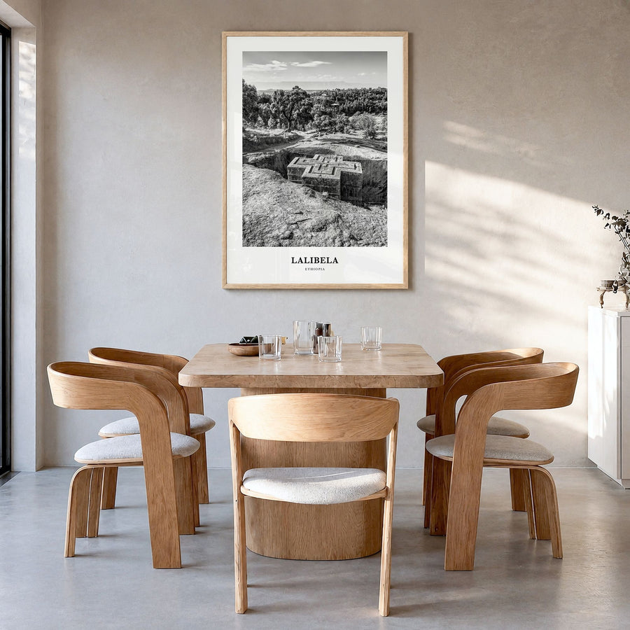 Lalibela Classic Poster in a natural wood frame, hanging in a dining room
