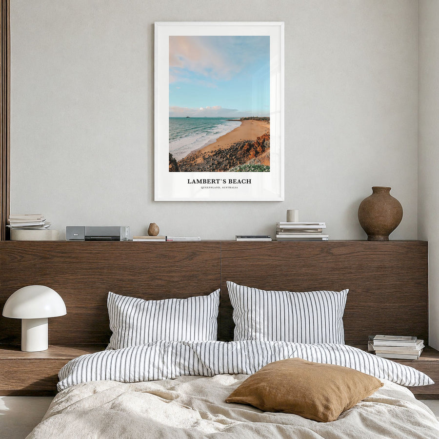 Lamberts Beach Classic Poster in a white wood frame, hanging in a bedroom