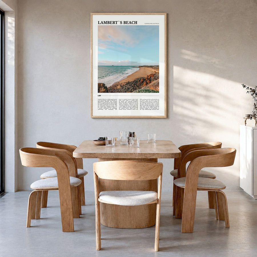 Lambert's Beach Travel Poster in a natural wood frame, hanging in a dining room