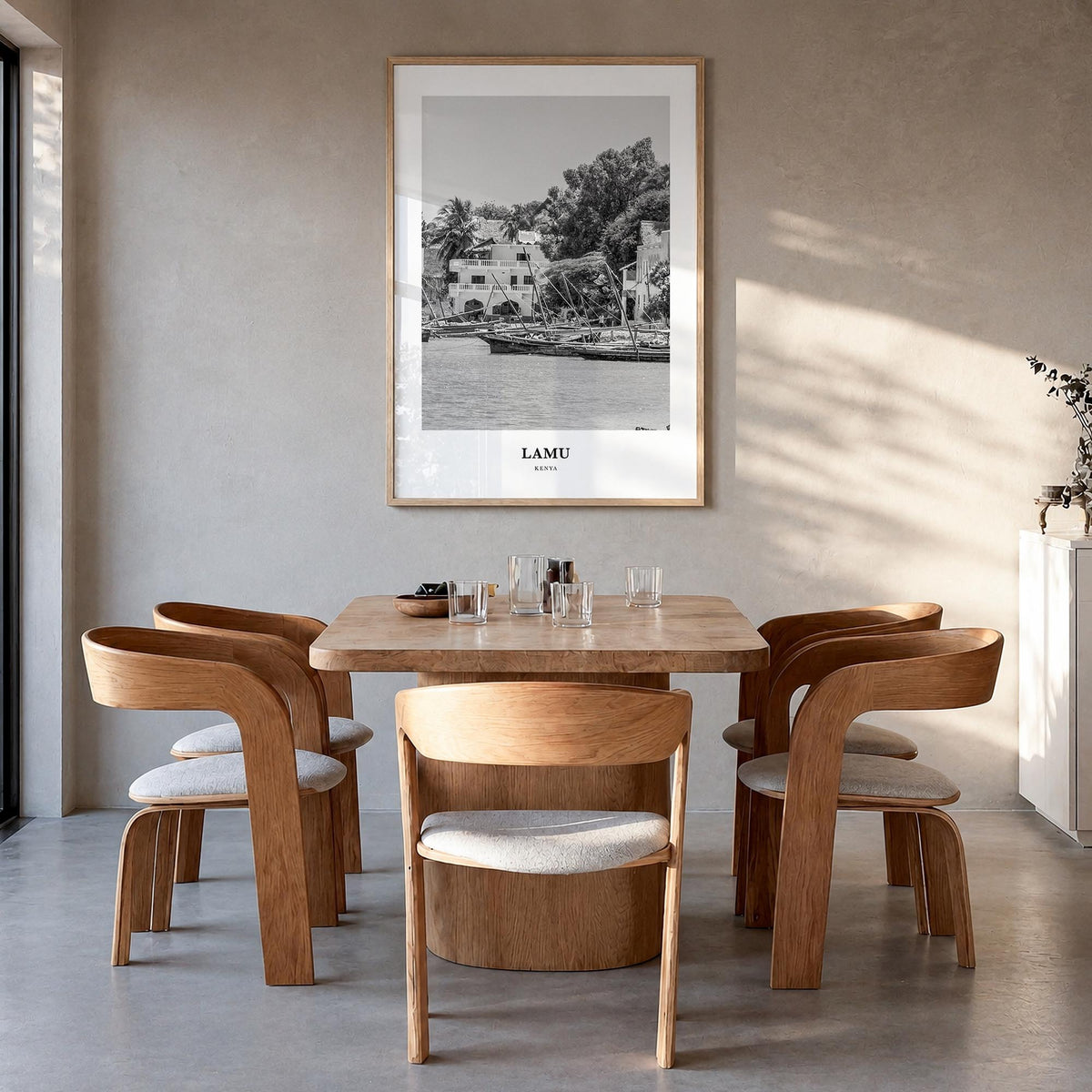 Lamu black & white classic poster of Kenya – vertical wall art in natural wood frame, hanging on wall