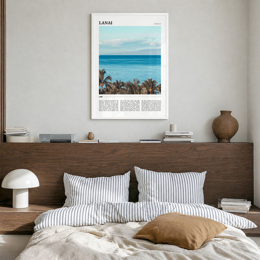 Lanai Travel Poster in a white wood frame, hanging in a bedroom