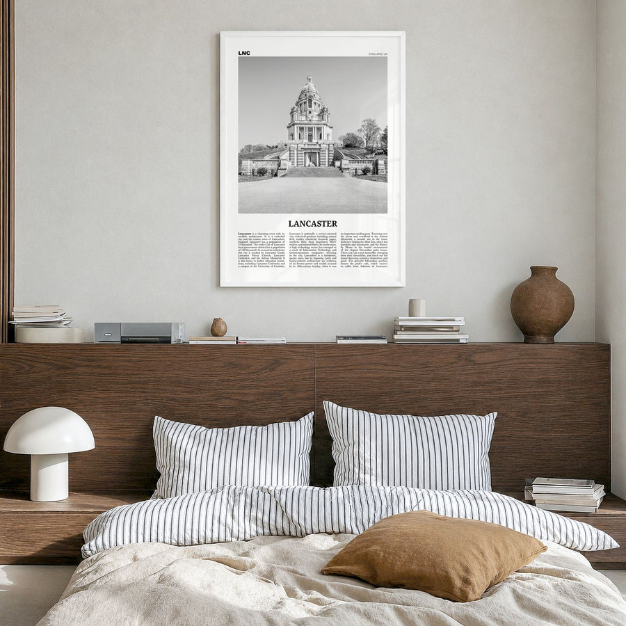 Lancaster, England Newspaper Poster in a white wood frame, hanging in a bedroom