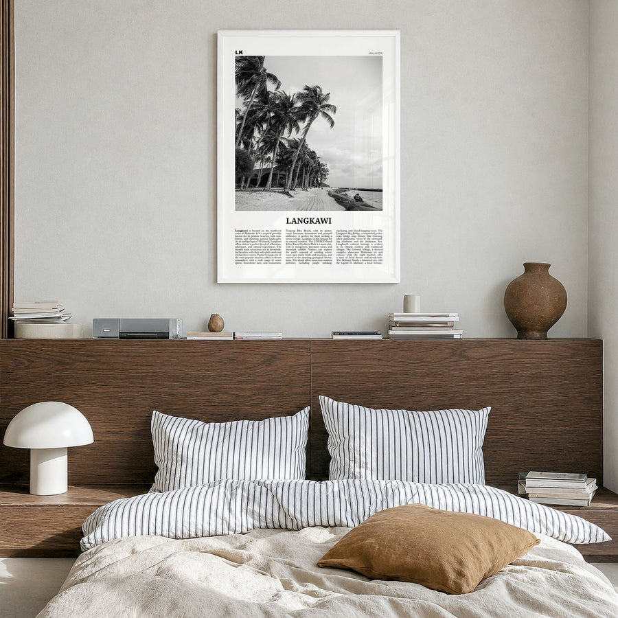 Langkawi Newspaper Poster in a white wood frame, hanging in a bedroom