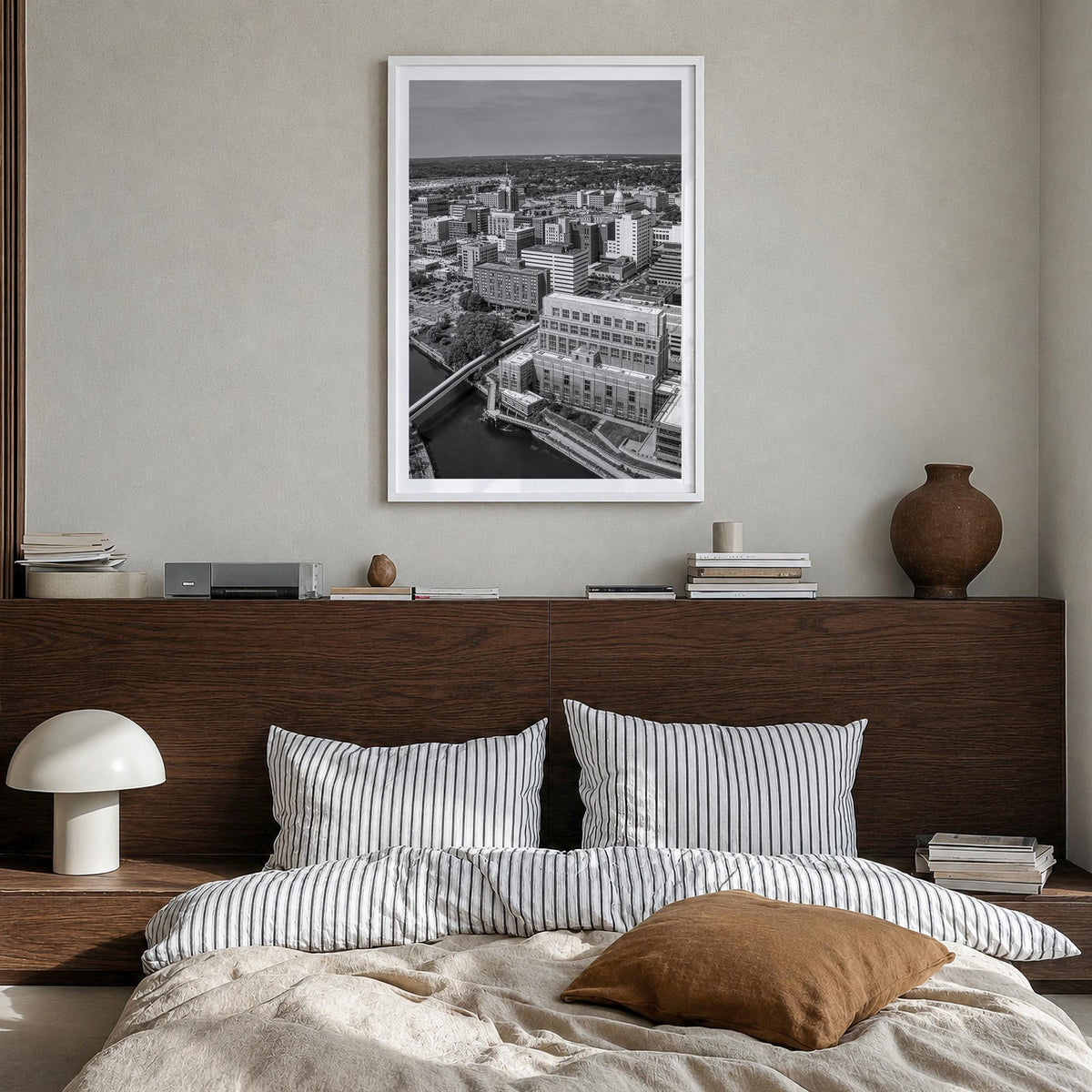Lansing black & white photo poster of Michigan, USA – vertical wall art in white wood frame with white border, hanging on wal