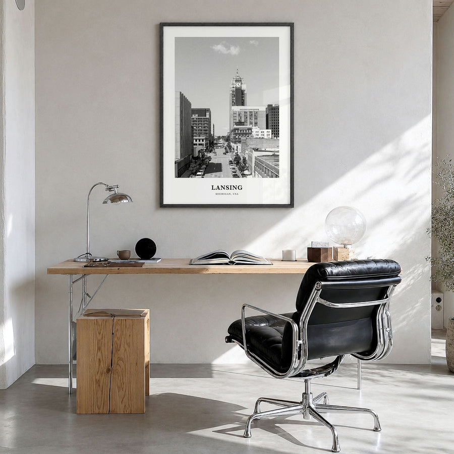 Lansing Classic Poster in a black wood frame, hanging in a bright home office