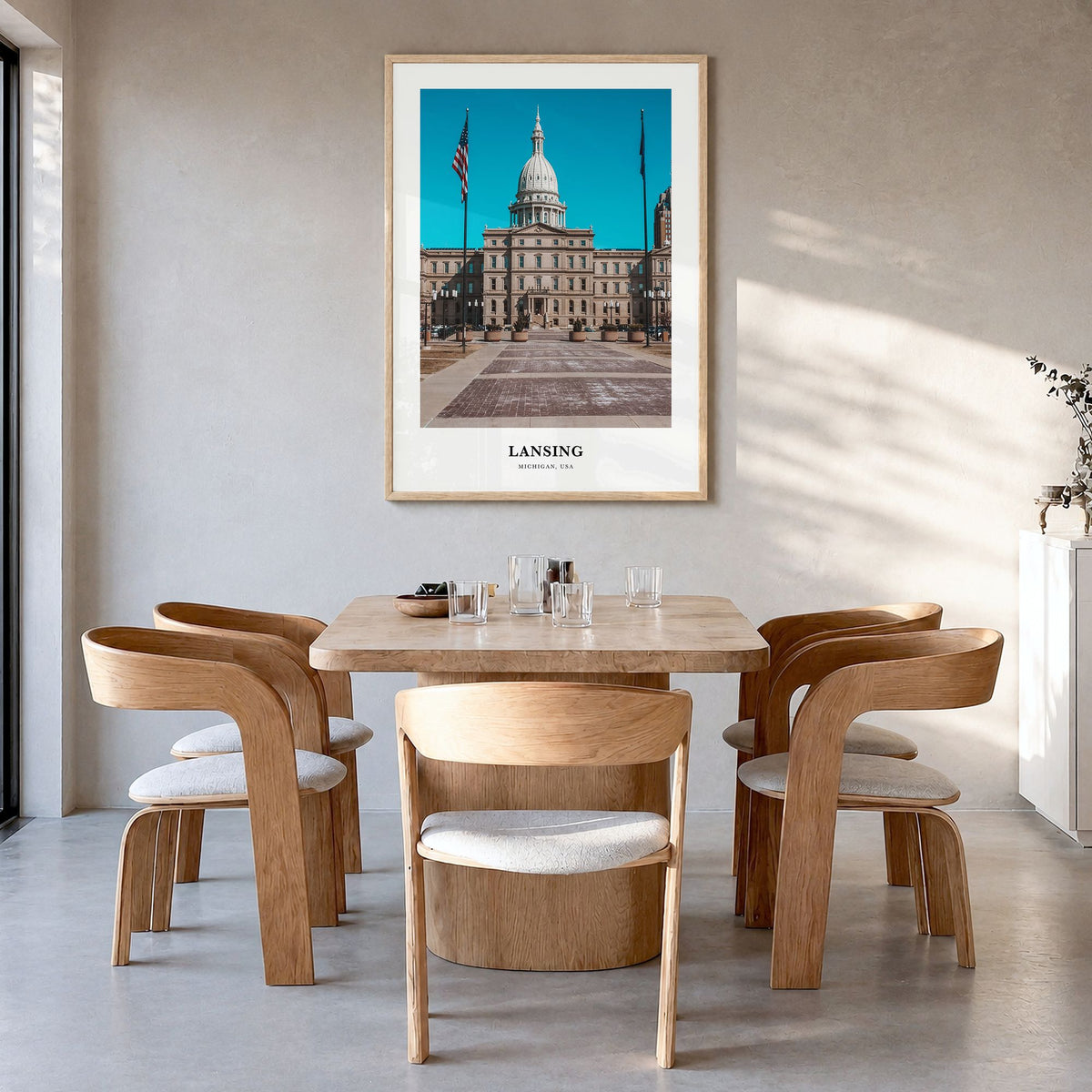 Lansing Classic No 1 Poster in a natural wood frame, hanging in a dining room