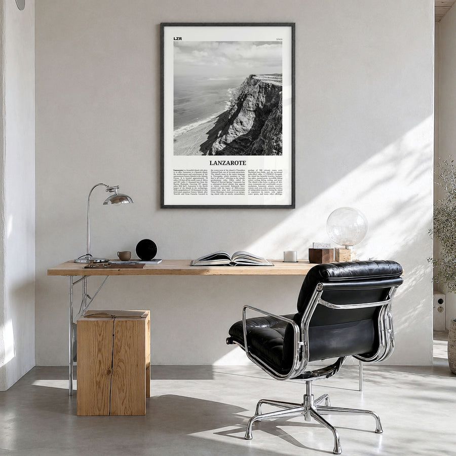 Lanzarote Newspaper Poster in a black wood frame, hanging in a bright home office
