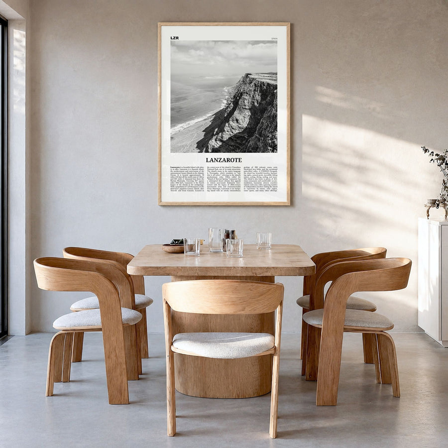 Lanzarote Newspaper Poster in a natural wood frame, hanging in a dining room