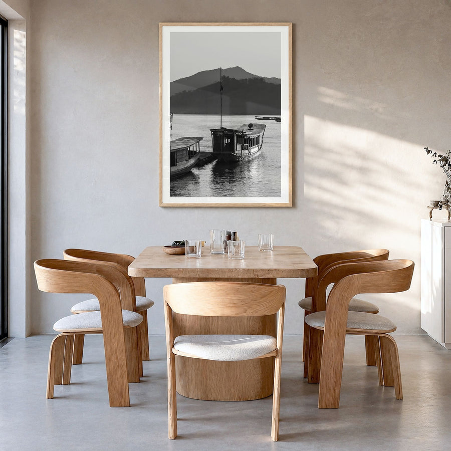Laos Photo Poster in a natural wood frame, hanging in a dining room, white border